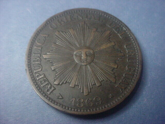 Read more about the article Uruguay 1869 H 4 Centesimos Sun Face Copper Crown #67913