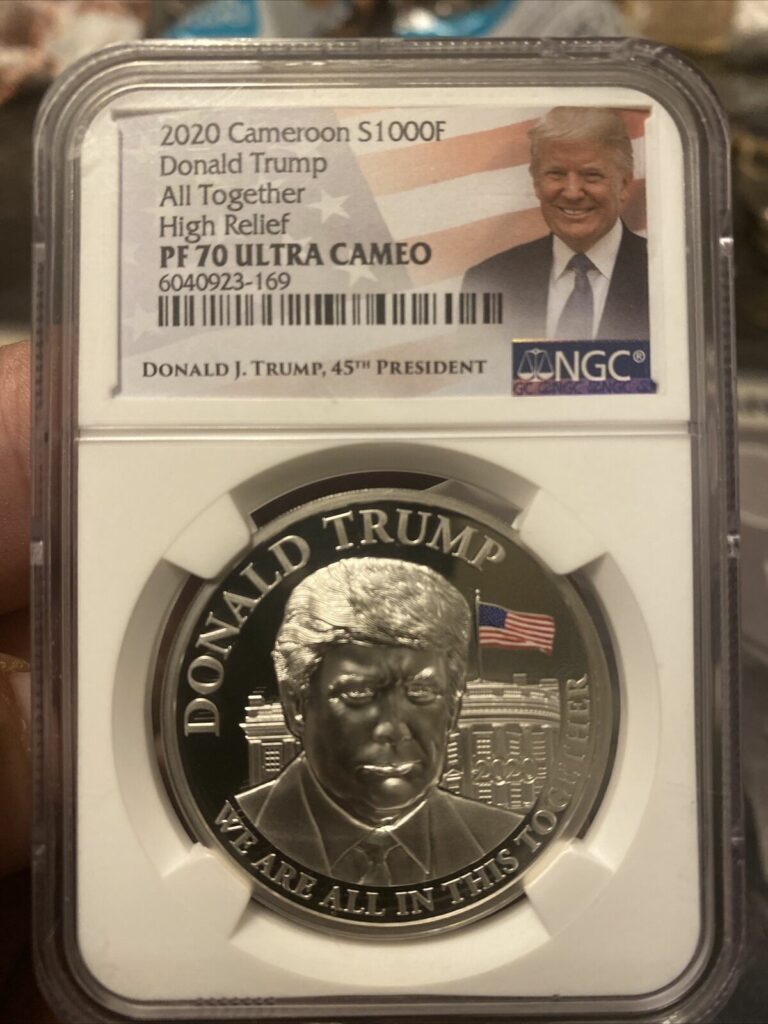 Read more about the article 2020 Cameroon S1000F Donald Trump All Together High Relief NGC PF 70 Ultra Cameo