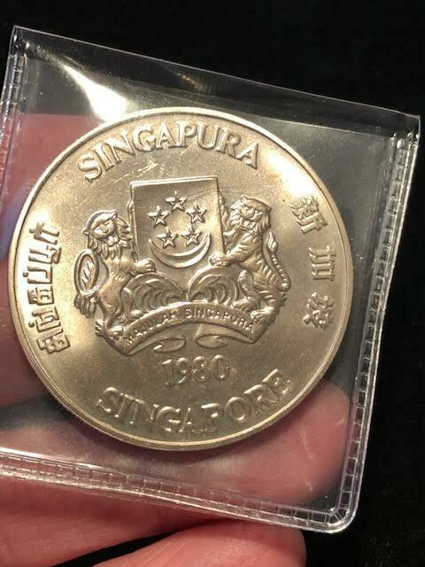 Read more about the article Heavy 1980 Signapore International Financial Center 50 Dollars Silver Coin