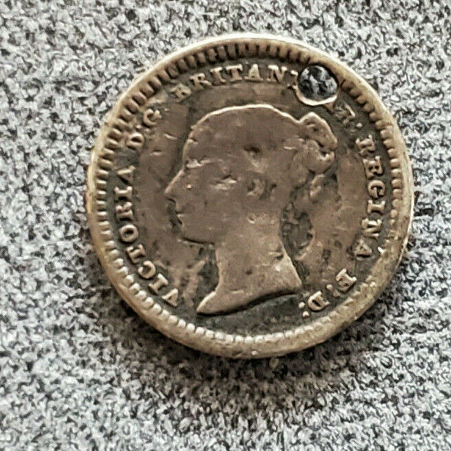 Read more about the article 1839 JAMAICA 1 1/2 PENCE SILVER HOLED