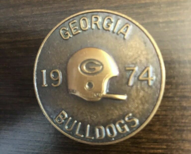 Read more about the article SET 7 GEORGIA BULLDOGS SCHEDULE COINS – Herschel Walker Heisman 1982 Season!