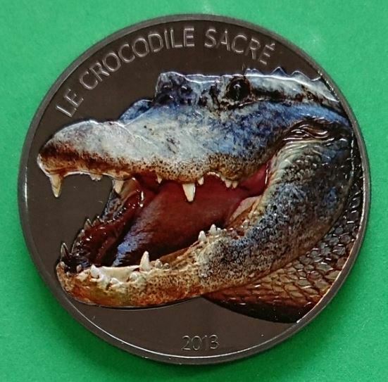 Read more about the article Burkina Faso 2013 1.000 Francs Crocodile Sacre 1 OZ Colored Silver Coin RARE