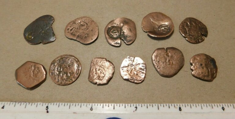 Read more about the article 1600s or earlier Spanish coins  treasure of 11 pieces LOW GRADE  !!