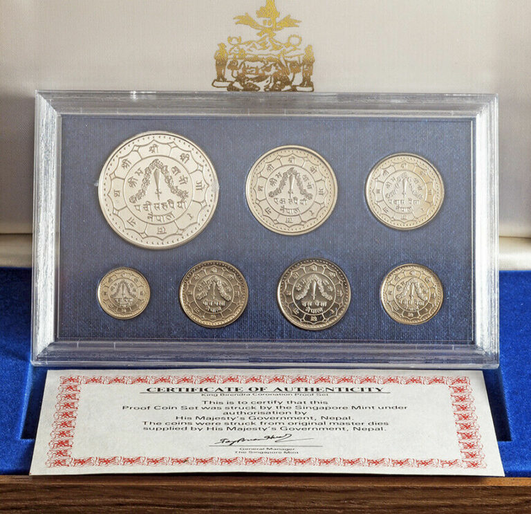 Read more about the article 1981(1974)  Nepal. “7th Coronation Anniv.” Proof Coins Set in Wooden Box w. COA!