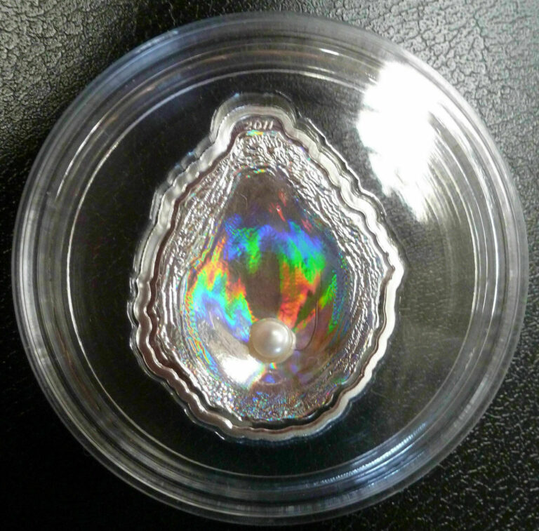 Read more about the article Palau 2011 Oyster Natural Pearl Silver Proof Hologram Shell Shaped Coin COA #22