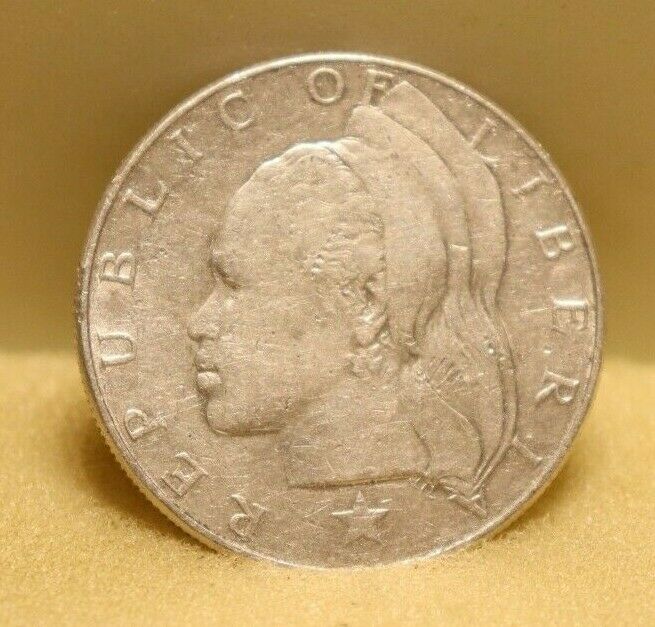 Read more about the article Liberia 1 Dollar 1962 Silver KM # 18 U.S. MINT -F+