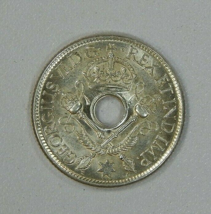 Read more about the article New Guinea Sterling Silver Shilling Coin 1938  Lustrous #2