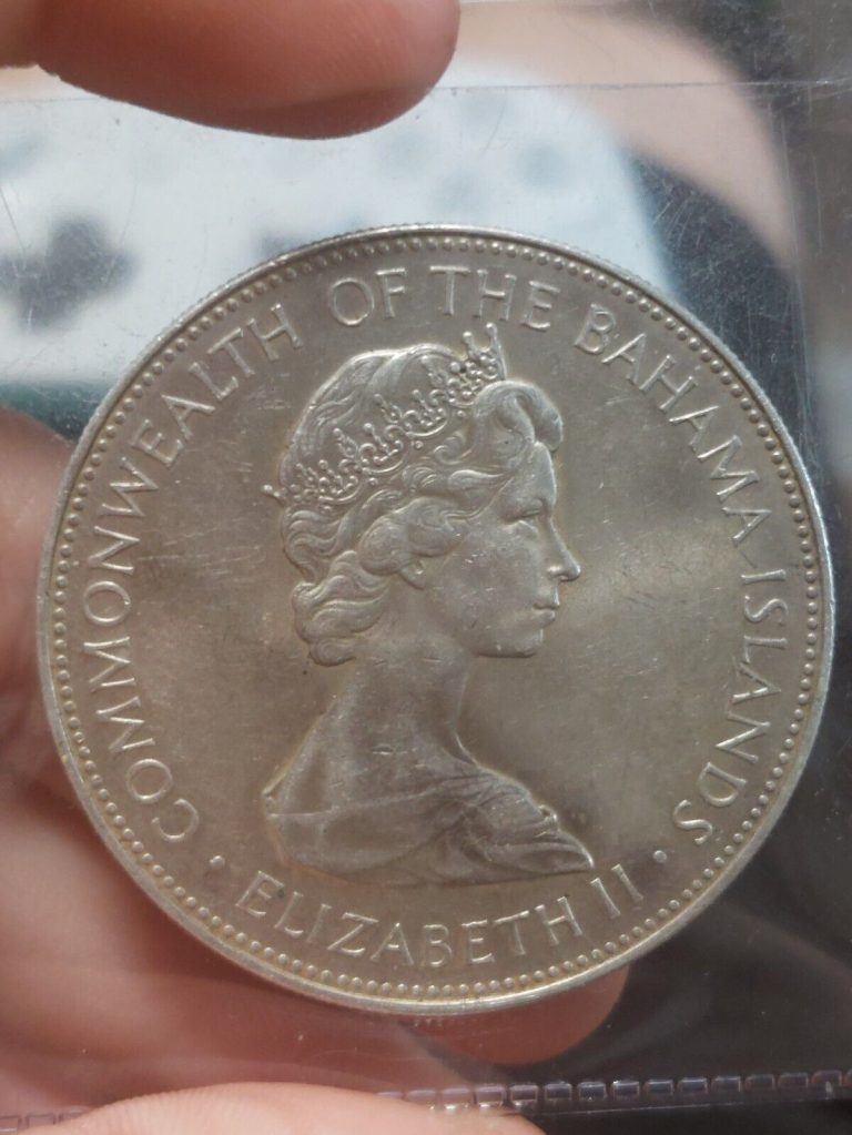 Read more about the article 1971 BAHAMAS HUGE Large PIRATE DEFEAT MOTTO Genuine Silver 5 Dollars Coin