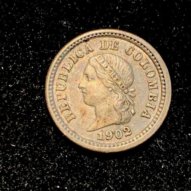 Read more about the article 1902 Columbia 5 Centavos  Silver Plata Coin w/ rainbow toning