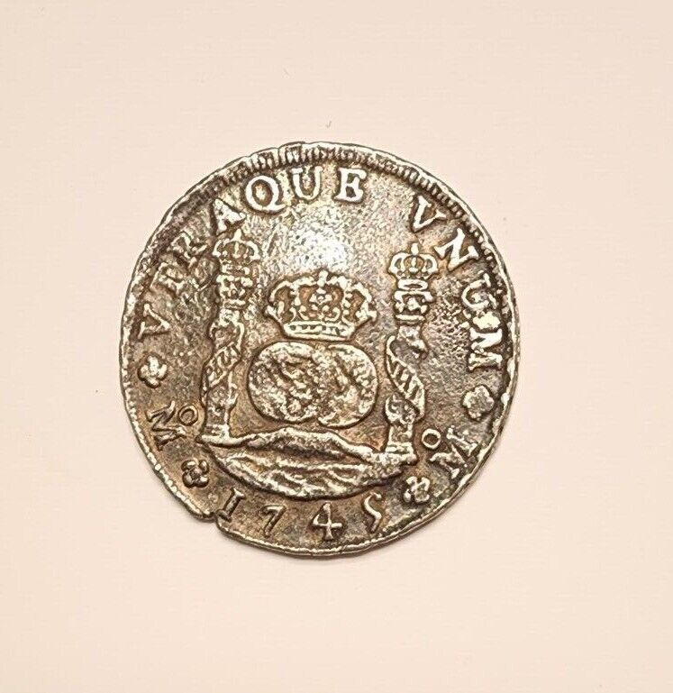 Read more about the article Lot of 2 Pirate treasure  8 Reales dated 1745 use as Pirate-themed party favor!