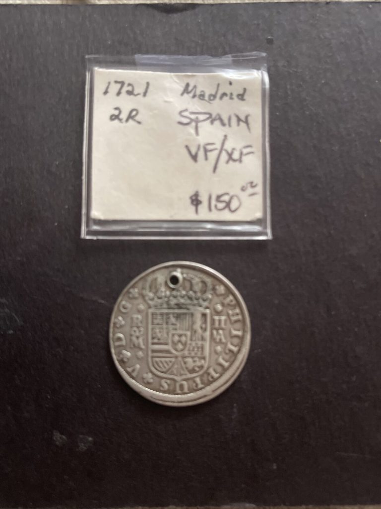 Read more about the article 1721 Spain 2 Reales Treasure Shipwreck Holed Beautiful Silver Coin in VF-XF Cond