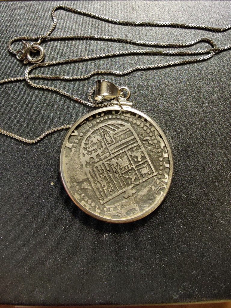 Read more about the article Atocha Spanish Colonial 4 Reale Shipwreck Coin  Pendant and Chain.