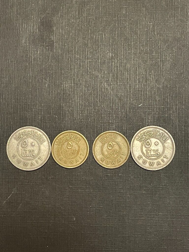 Read more about the article Lot of (4) 1961 and 1962 5 Fluce  Two 1961 50 Flsa kuwait Coins