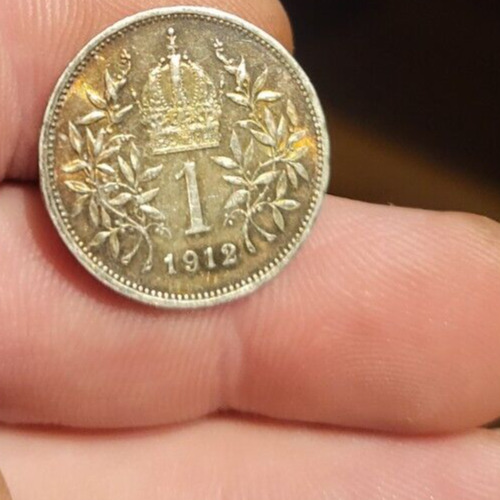 Read more about the article 1912 Austria Hungary 1 Corona SILVER Coin  with awesome gold tone luster