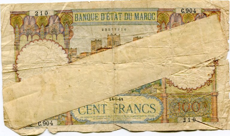 Read more about the article Morocco 100 Francs 1941 issue repaired lotmar9121