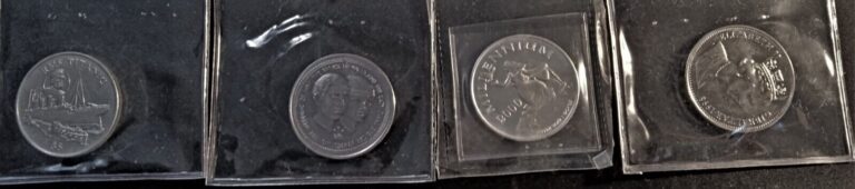 Read more about the article 4 coins  Gibraltar  Isle of Man  2 from Liberia(1 is silver) all uncirculated