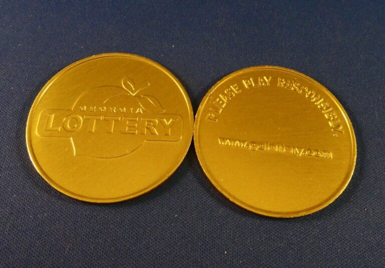 Read more about the article TWO: Official Uncirculated Georgia Lottery – “SCRATCHER” Coins