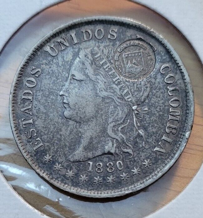 Read more about the article 1889 Costa Rica 50 Centavos Type VIII Counterstamped on 1880 Colombia 50 Centavo