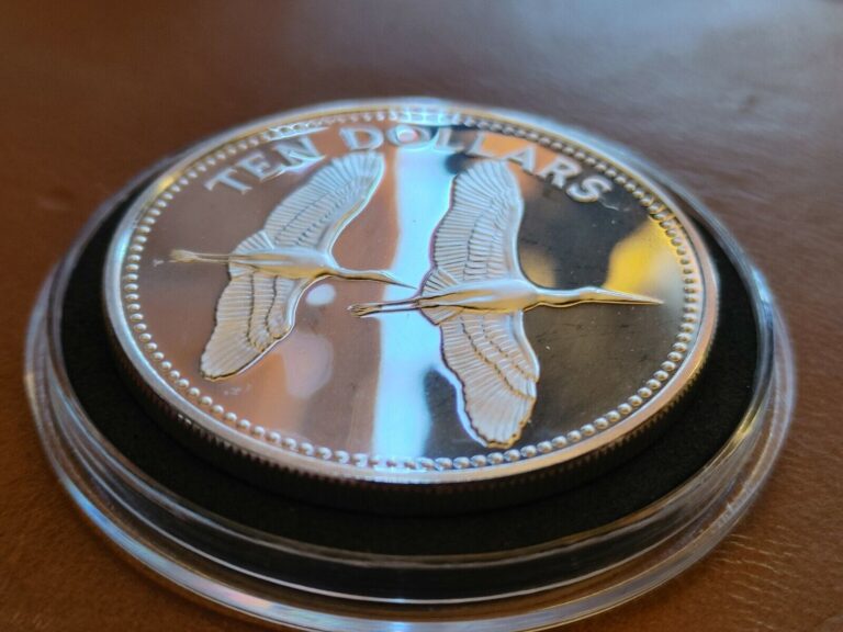 Read more about the article Excellent Extremely RARE 1979 BELIZE STERLING SILVER 10 TEN DOLLARS and HOLDER