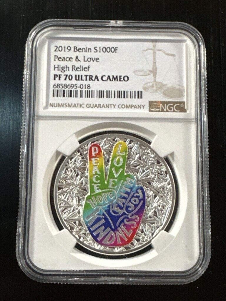 Read more about the article 2019 Benin NGC PF70 Ultra Cameo Peace and Love 1 oz Silver Proof Coin colorized.