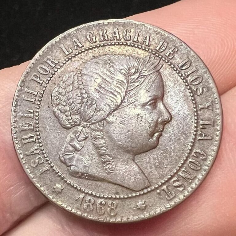 Read more about the article 1868 OM Spain 2 1/2 Centimes AU Copper Coin F1231