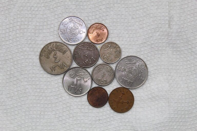 Read more about the article Saudi Arabia coins  10 total  ¼ Ghirsh 1344  1356  ½ Ghirsh 1356  2G  4G  100H