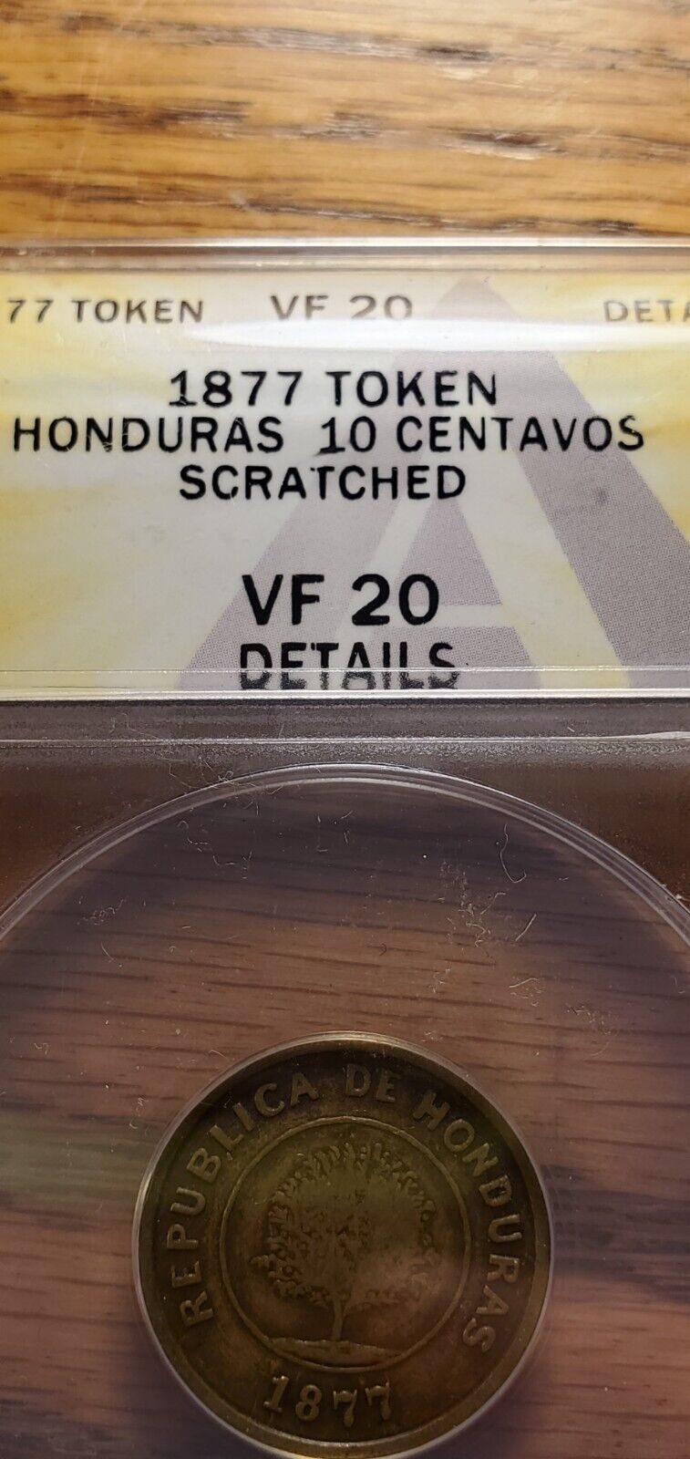 Read more about the article 1877 Token HONDURAS super scarce  only this one is known at the moment Anacs VF