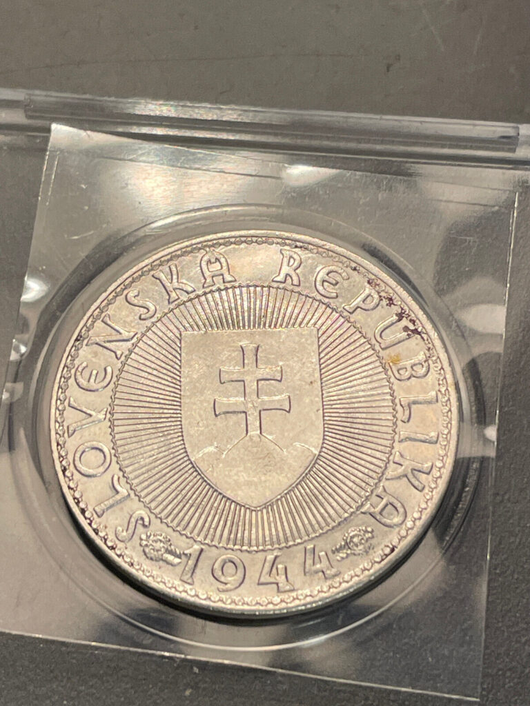 Read more about the article S3 – Slovakia 10 Korun 1944 Uncirculated Silver Coin – Cross – w/ Plastic Case!!