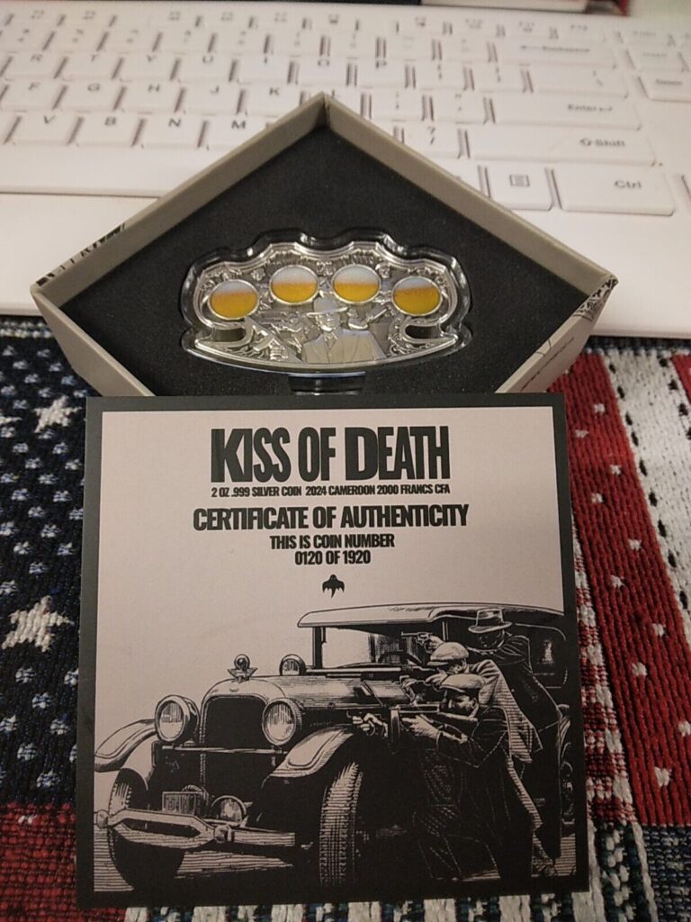 Read more about the article 2024 Cameroon Kiss of Death 2 oz Silver Antiqued Colorized Mintage 1920 LOT#542