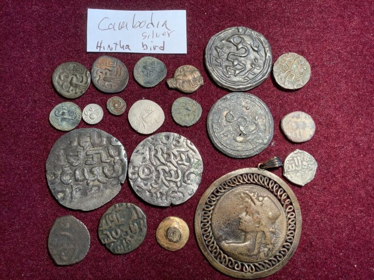 Read more about the article CAMBODIA COLLECTION of 20 Silver etc COINS. 1 Gold Disc. ex French Occupation