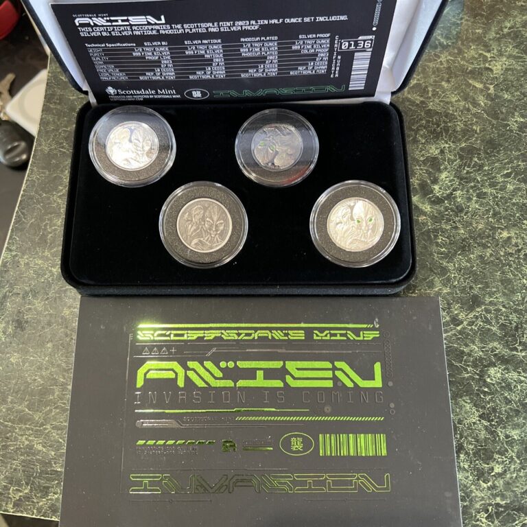 Read more about the article Scottsdale Mint Ghana Alien Invasion 4x 1/2 Oz Silver Coins .999 Silver  COA Box