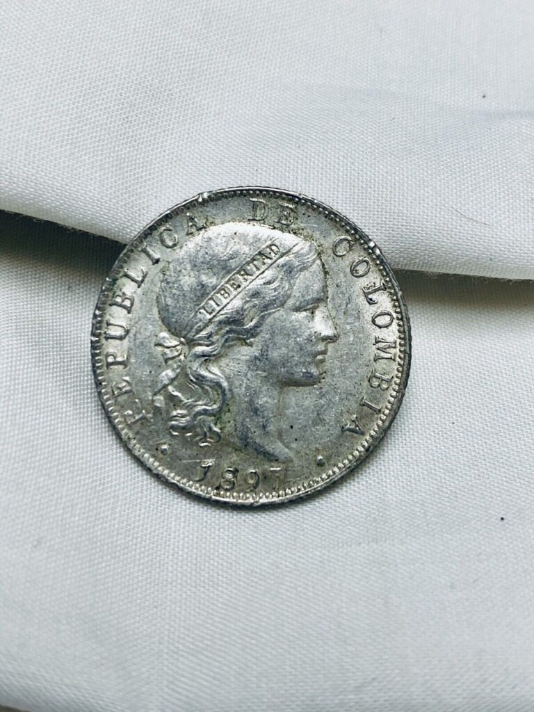 Read more about the article Colombia 1897 Silver 20 Centavos Coin AU+ Details- Great Condition