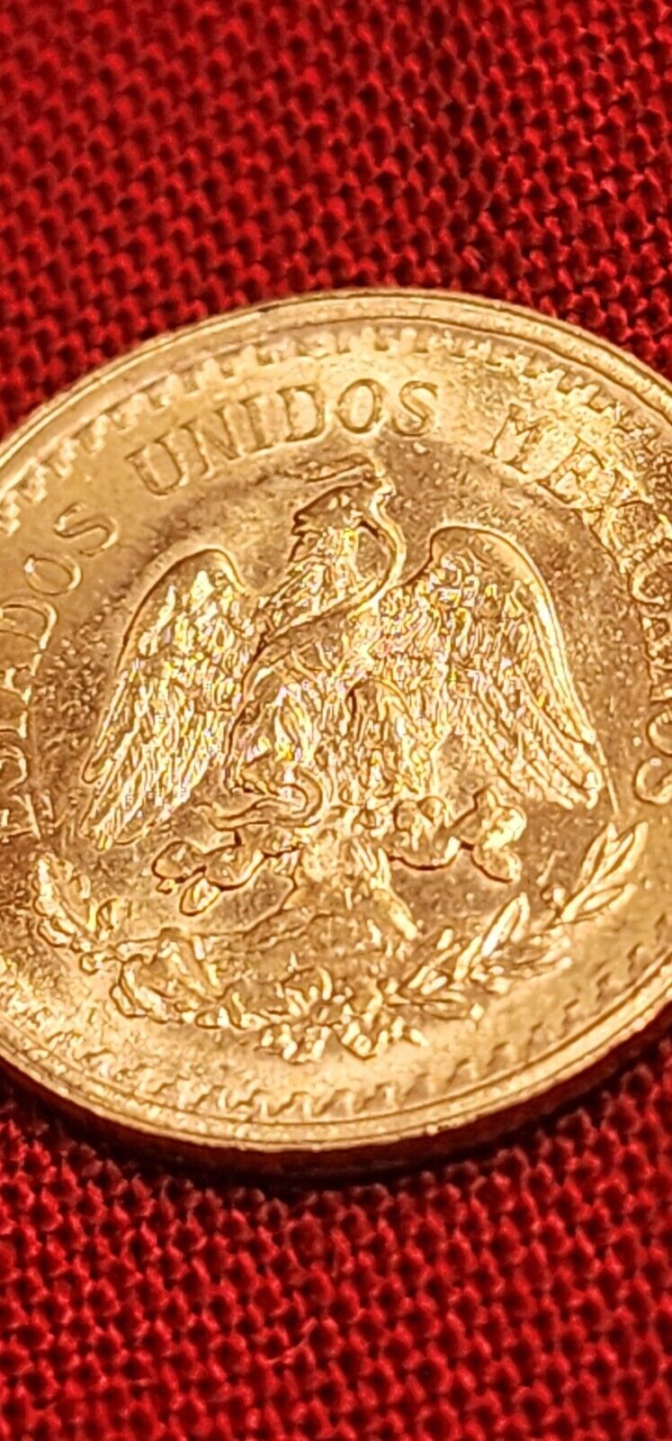 Read more about the article FAMILIA CENTENARIO 1945 Mexico Gold 2.5 Dos y Medio Pesos Gold Coin GEM BU MS++