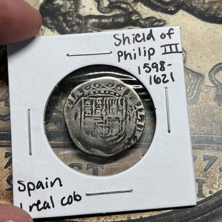 Read more about the article shield of philip III 1598-1621 spain 1 real silver cob shipwreck coin