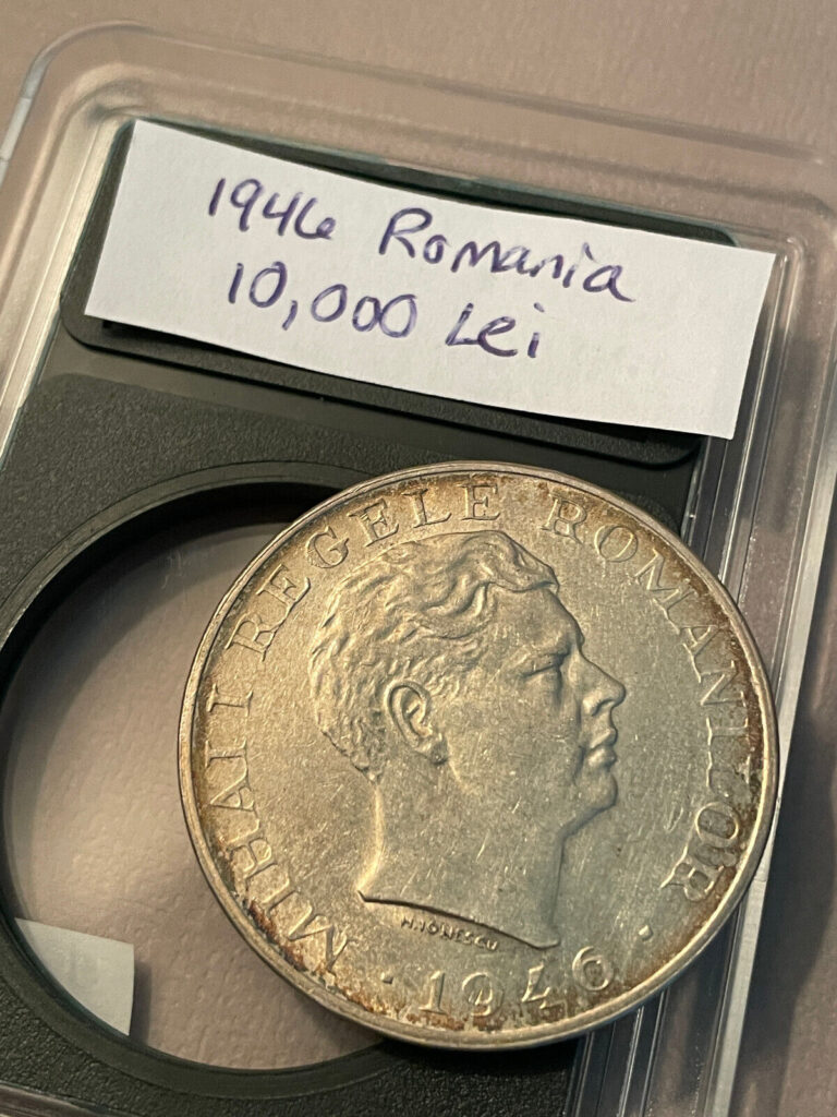Read more about the article 1946 Romania 100 000 Lei Silver Coin w/ Plastic Case!