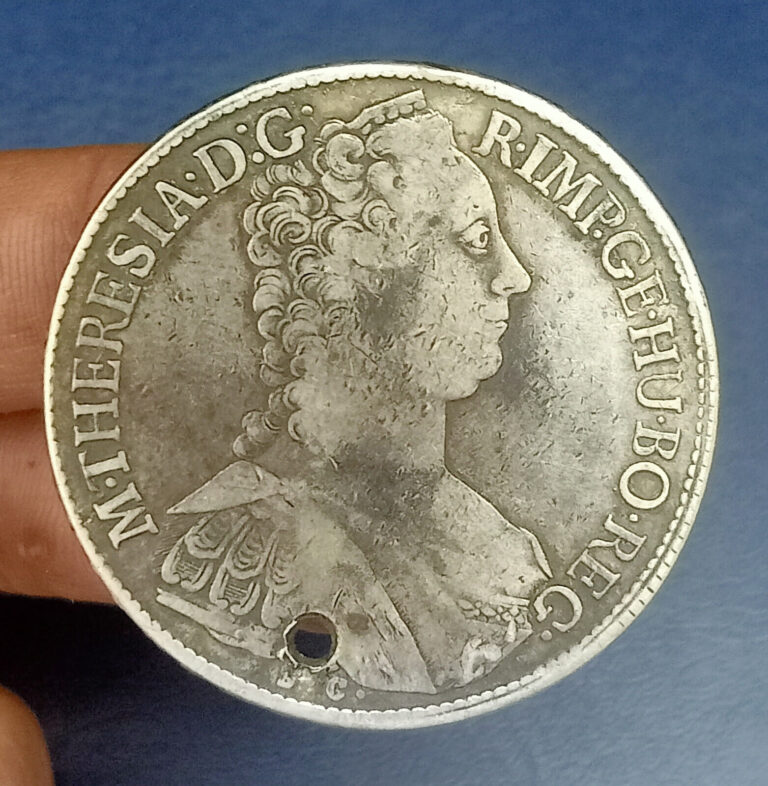 Read more about the article C32. 1765 Austria Hungary Theresia Thaler Hole Silver Coin