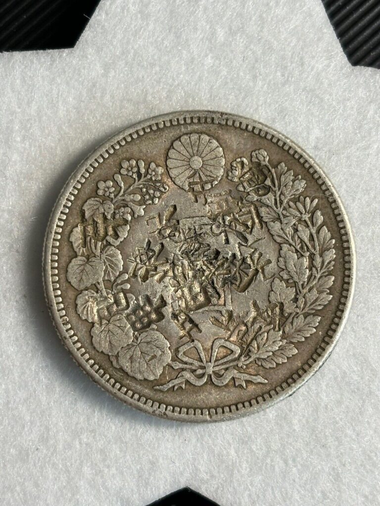 Read more about the article 1893 Japan Meiji M26 Silver One Yen Chopmarked