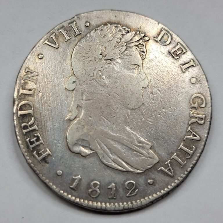 Read more about the article 1812 NG GUATEMALA Silver 8 Reales w/ Vintage Collector tag Tough Mint *G882