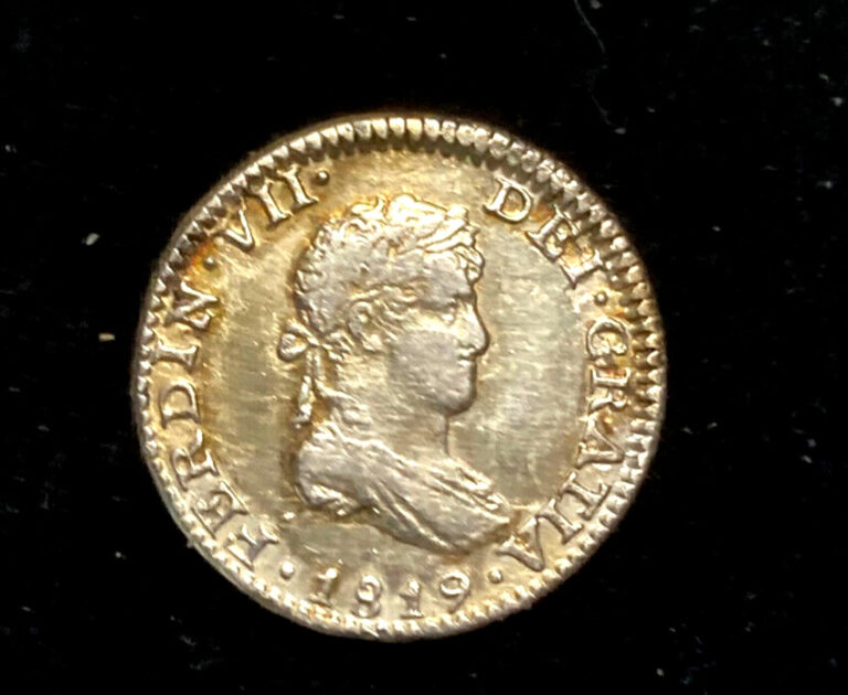 Read more about the article Excellent Ferdinand VII Spain Colonial 1/2 Real Coin 1819