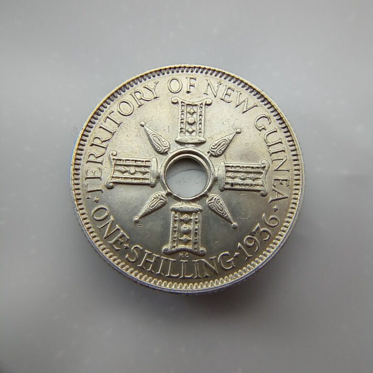 Read more about the article Papua New guinea territories. One Shiling George V 1936 keydate Silver Coin. E78