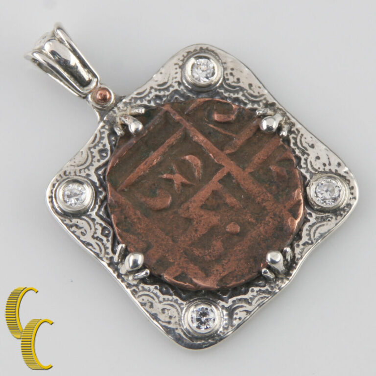 Read more about the article BHUTAN COIN IN SILVER BEZEL PENDANT