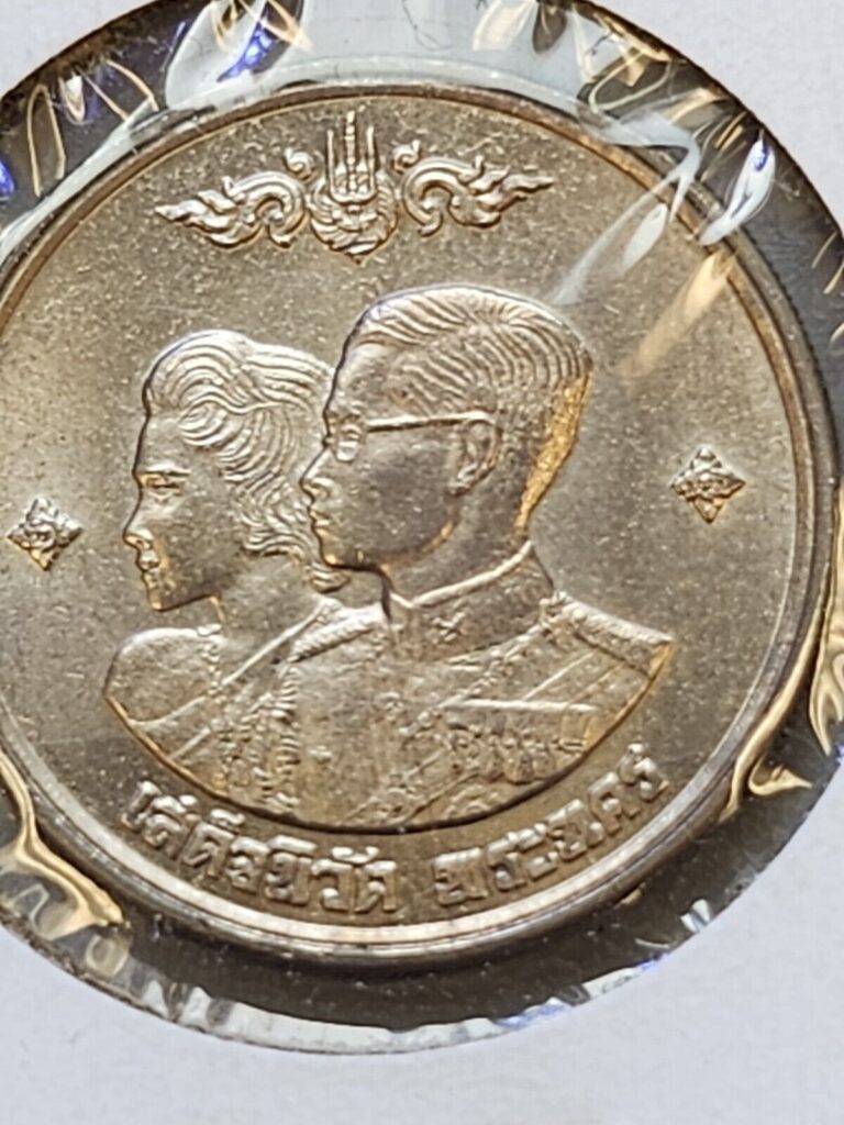 Read more about the article BE2504 / 1961 Thailand 1 Baht Coin brilliant uncirculated Queen Mother