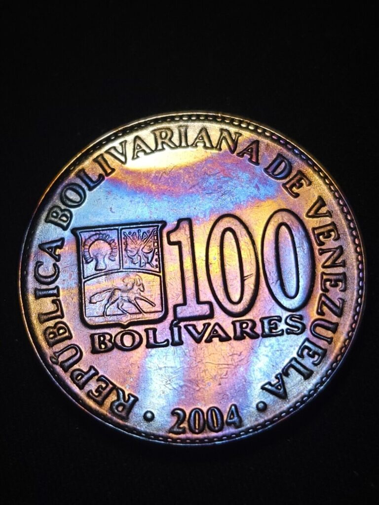 Read more about the article Venezuela 100 Bolivares 2004 Rainbow Toned
