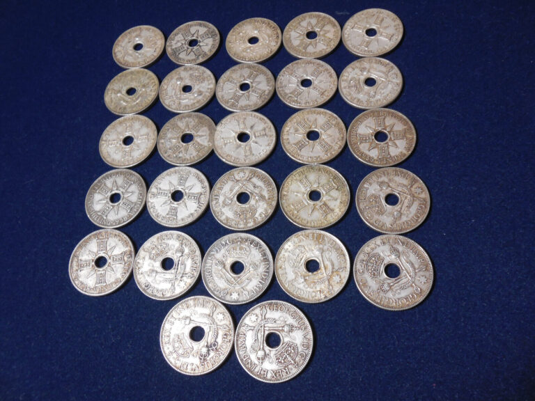 Read more about the article New Guinea  27 Sterling Silver Shilling Coins (bl30)