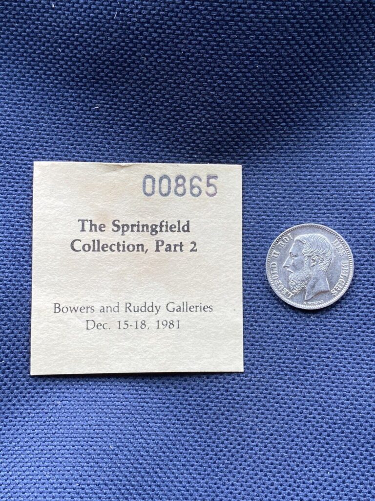 Read more about the article A 1899 Belgium Silver 50 Centimes French Legends Leopold II A.U.