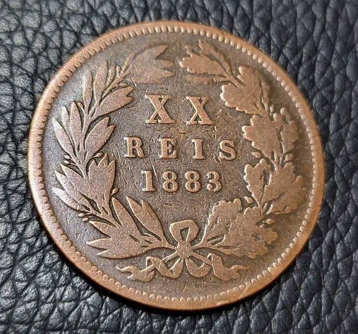 Read more about the article 1883 Portugal 20 Reis Coin