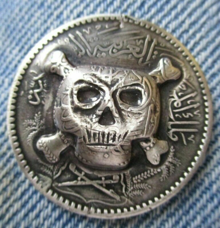 Read more about the article 1 RIYAL  SAUDI ARABIA with Skull and Bones 3D Pop Push Punch Out Repousse coin