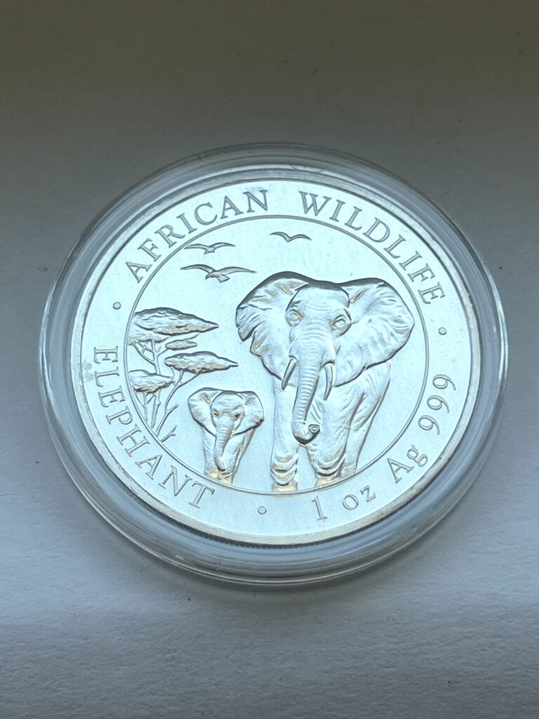 Read more about the article ✅ 2015 SOMALIAN Somali ELEPHANT African Wildlife 1 oz Silver Coin in Capsule