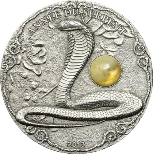 Read more about the article Togo 2013 1500 Francs Année du Serpent Year of the Snake 2 Oz Silver Coin Amber