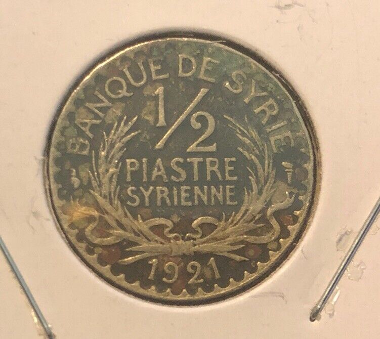 Read more about the article 1921(a) France-Banque De Syrienne 1/2 Copper Nickel Coin-KM#68